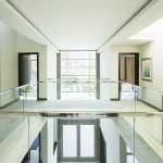 Modern balcony and open foyer in luxury home